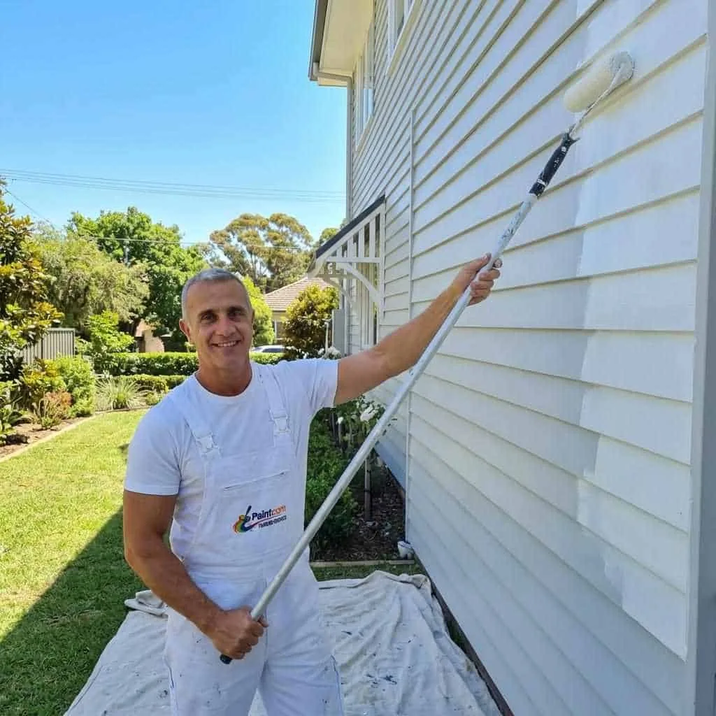 Residential painting — Paintcom painter at work in Sydney