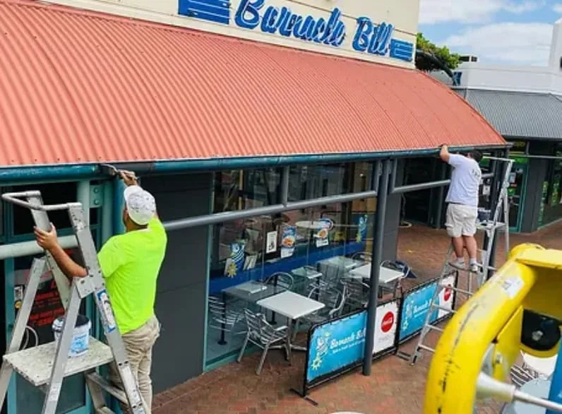 Commercial & office — Paintcom painter at work in Sydney